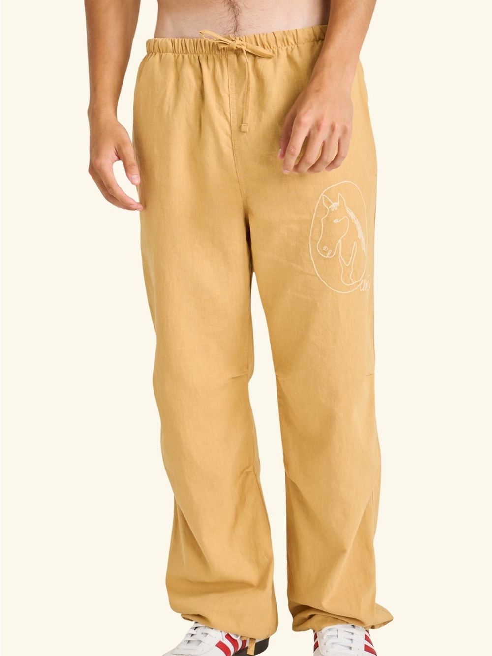 Cherry LA Men's Drawstring Linen Pants in Mustard Yellow with Horse Outline